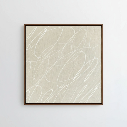 Framed abstract artwork with black background and white lines in a natural dark wood frame