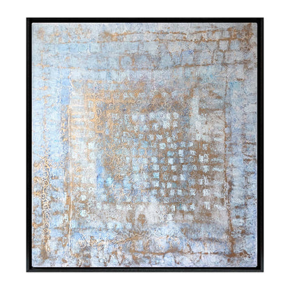 Abstract painting with weathered blue and ochre textures resembling aged Italian palazzo walls, framed in a black wood floater frame. Palazzo Silenzioso coastal art by Nadée.