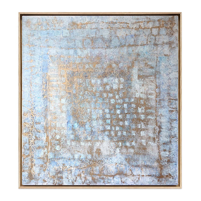 Abstract painting with weathered blue and ochre textures resembling aged Italian palazzo walls, framed in a natural wood floater frame. Palazzo Silenzioso coastal art by Nadée.