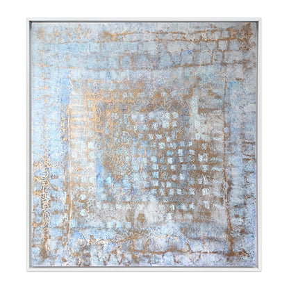 Abstract painting with weathered blue and ochre textures resembling aged Italian palazzo walls, framed in a white wood floater frame. Palazzo Silenzioso coastal art by Nadée.