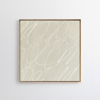 Framed abstract artwork with black background and white lines in a natural wood frame