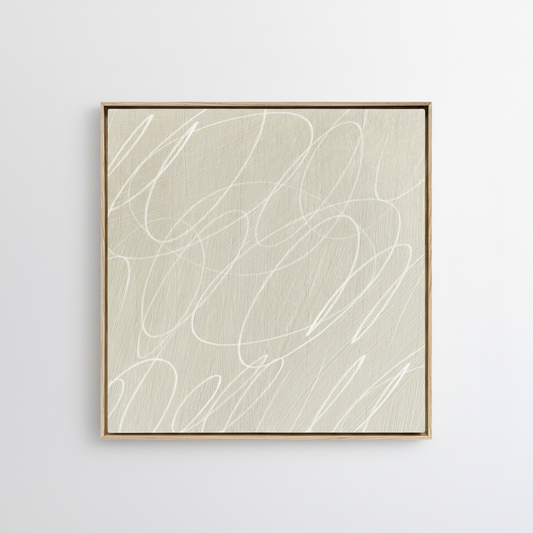 Framed abstract artwork with black background and white lines in a natural wood frame