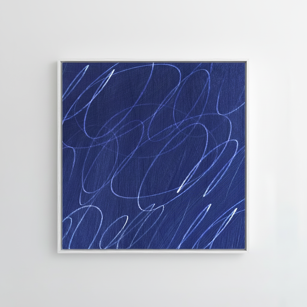 Framed abstract artwork with marine blue painted background and white gestural lines in a natural white wood frame