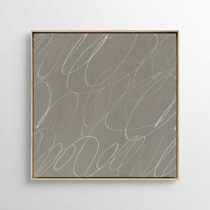 Minimalist abstract framed canvas wall art featuring gestural brushstrokes in soft fog gray and warm neutral tones in a natural wood frame.