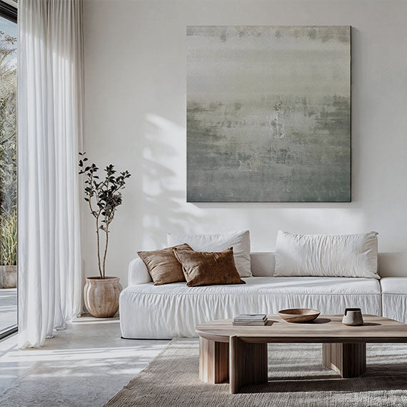 Abstract minimalist art print on canvas of neutral serene green and gray tones in a white, neutral minimalist room, California chic, Florida chic. Credits: ©2024 Nivas Kanhere / Artmajeur.com x Art Collectiv.